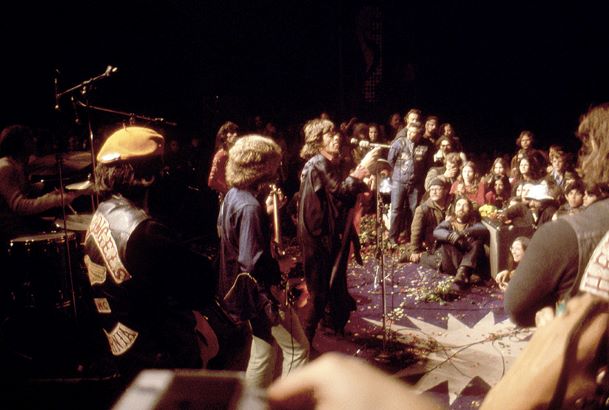 LIVERMORE, CA - DECEMBER 6: (L-R) English guitarist Mick Taylor and English singer, songwriter, actor, and film producer Mick Jagger of the English rock band The Rolling Stones perform during the Altamont Speedway Free Festival, which was a counterculture rock concert held on Saturday, December 6, 1969, at the Altamont Speedway in Livermore, California. (Photo by Jeff Hochberg/Rock Negatives)