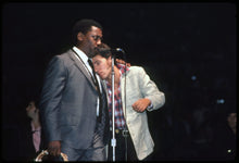 Springsteen being Comforted by Clarence Clemons