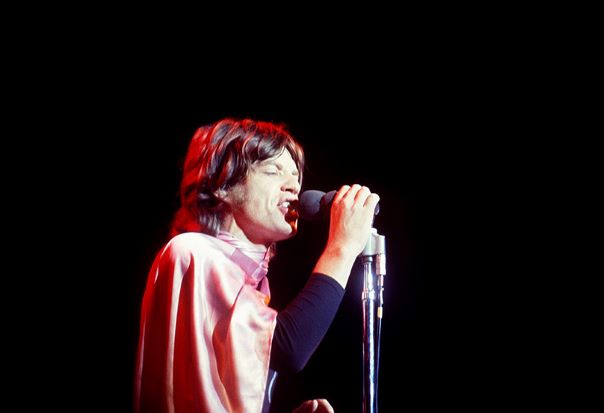 LIVERMORE, CA - DECEMBER 6: English singer, songwriter, actor, and film producer Mick Jagger of the English rock band The Rolling Stones performs during the Altamont Speedway Free Festival, which was a counterculture rock concert held on Saturday, December 6, 1969, at the Altamont Speedway in Livermore, California. (Photo by Jeff Hochberg/Rock Negatives)
